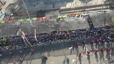 cenital view of a parade in the city of barranquilla, colombia