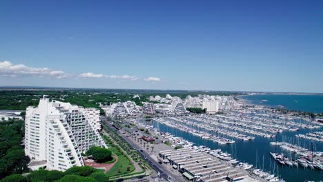 aerial dolly shot over the seafront resorts looking down onto the feu de la jetée est