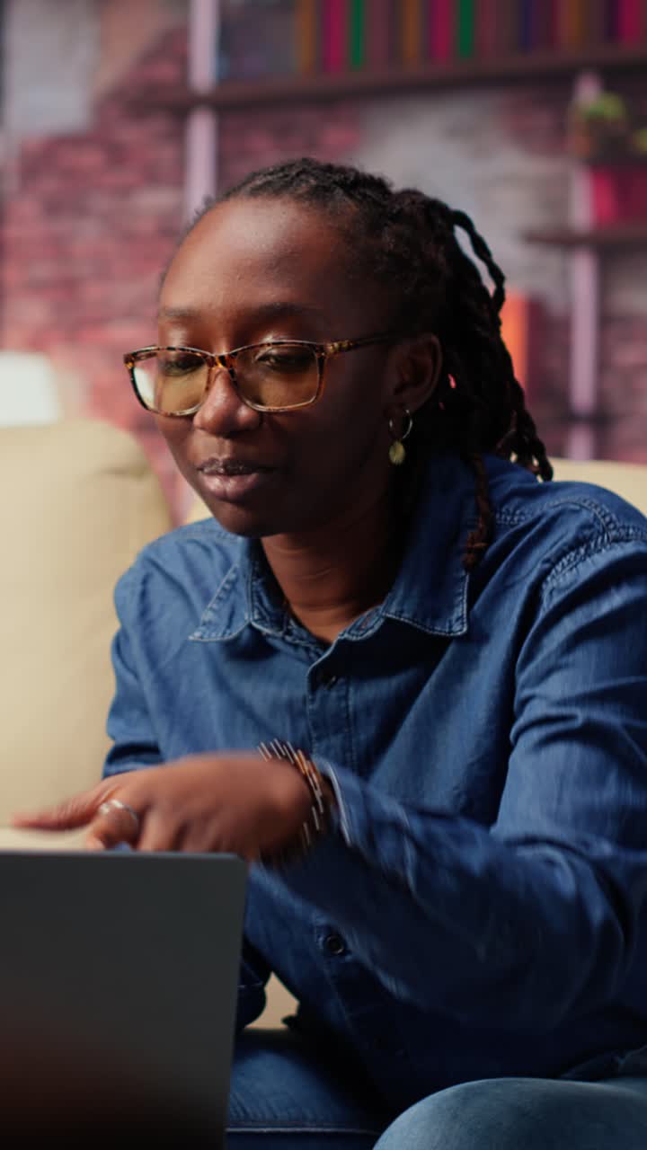 African American Woman Talking and Gesturing During Video Call