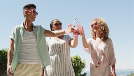 diverse friends enjoy a sunny day at the pool, with copy space