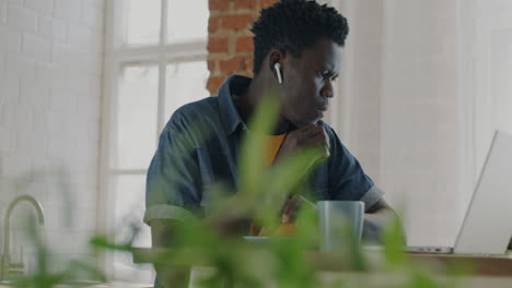 young man working from home