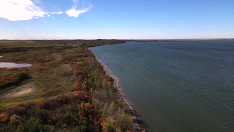 4k cinematic aerial footage from high above buffalo lake near rochon sands provincial park in alberta's prairies