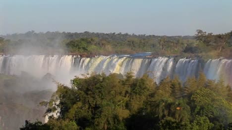 a slow pan across beautiful iguacu falls at the brazil argentina border