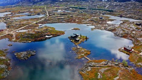 aerial drone shot of the nordic rocky landscape of the town of bjørnfjell at the swedish border.
high view of the arctic tundra and vast wilderness.