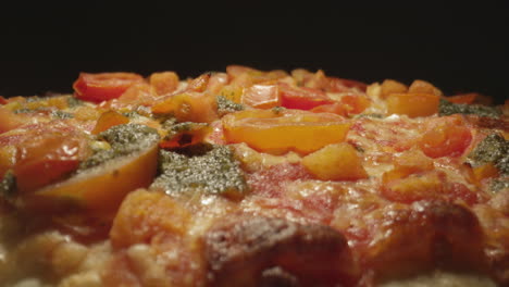 Close-up-macro-view-of-an-artisan-pizza-coming-fresh-out-of-the-oven