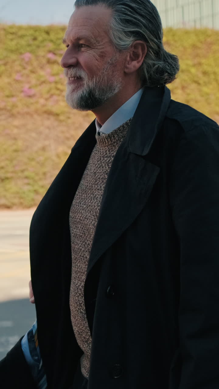 Smiling Businessman Walking in the City