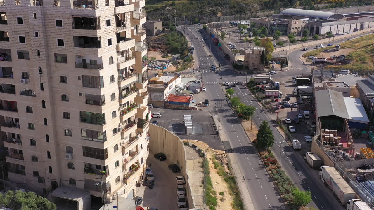 Security wall with Israeli idf watch tower Close to Shuafat Refugee Camp- Aerial