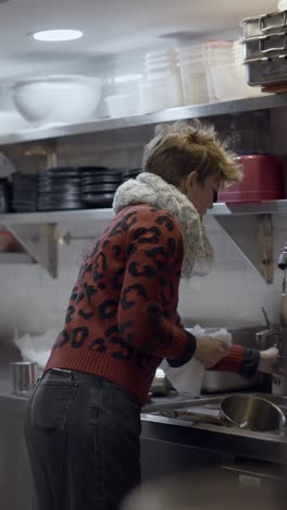 woman working in a professional kitchen