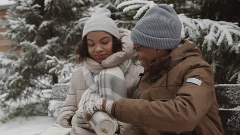 father and daughter enjoying a winter day together