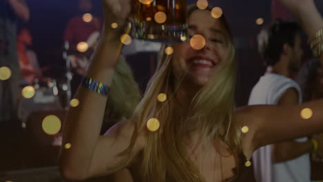 woman dancing with beer mug in bar, showing animated music notes and event marketing chart