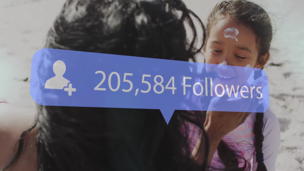 Animation of increasing followers over biracial mother and daughter playing at the beach