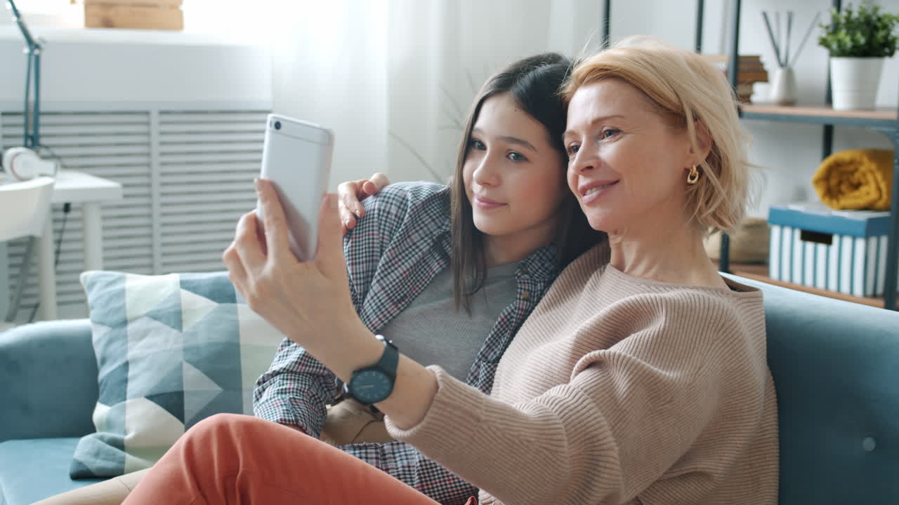 Grandmother and Granddaughter Taking a Selfie