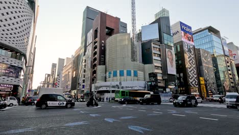 vehicles and pedestrians crossing an urban intersection