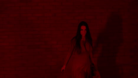 fast and energetic dancer dancing inside a red room