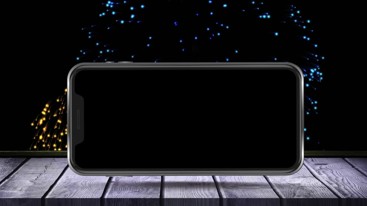 나무 표면 에 있는 빈 스마트폰 화면 의 애니메이션 과 배경 에 폭발 하는 불꽃놀이