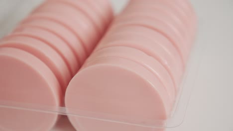 round wax cake taking from the package 4k footage