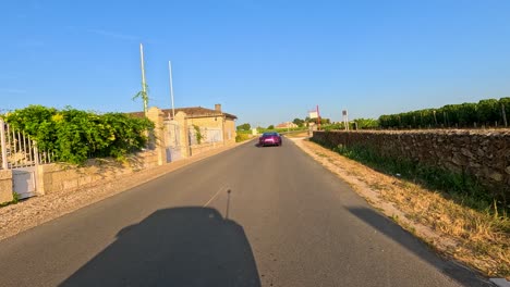 a hypercar journey through scenic vineyard roads