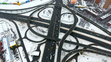 a busy outskirts road intersection in a high view.