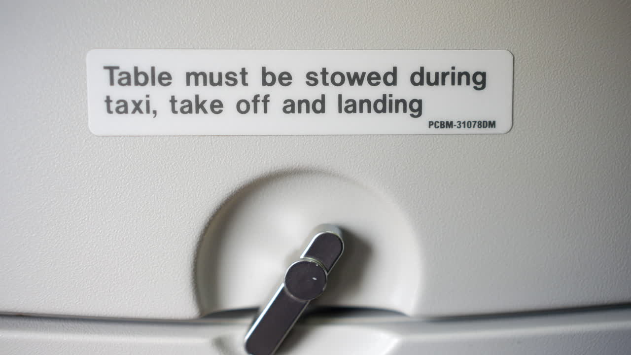 Airplane Table Stowing Instructions