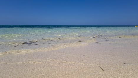 waves gently breaking on beach