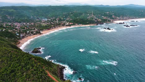 mazunte beach cliff oaxaca mexico aerial drone above aquarium sea turtle center