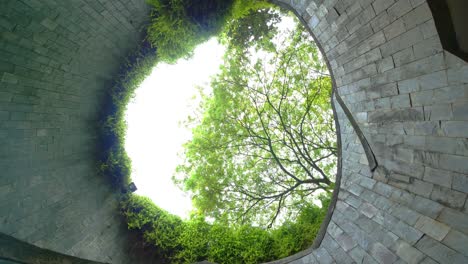 spiral staircase of underground crossing in tunnel at fort canning park, singapore