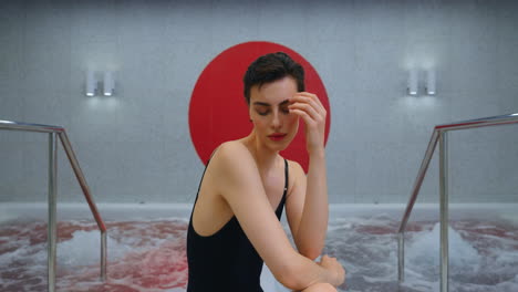 woman relaxing in a modern spa hot tub