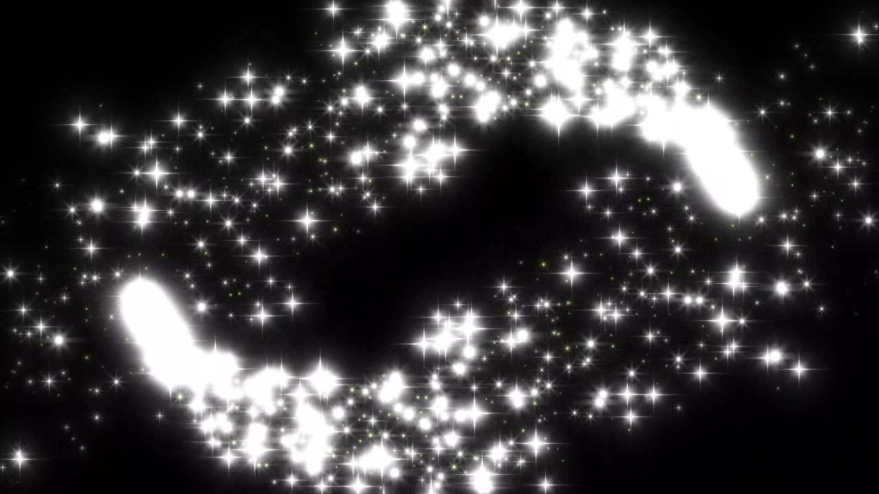 Scie luminose bianche scintillanti in movimento circolare su sfondo nero