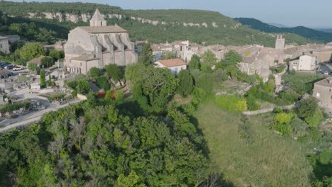 aerial drone luberon provence saignon france medieval town church at sunrise