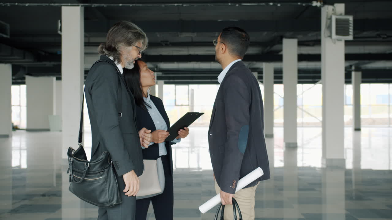 Business Meeting in Empty Commercial Space