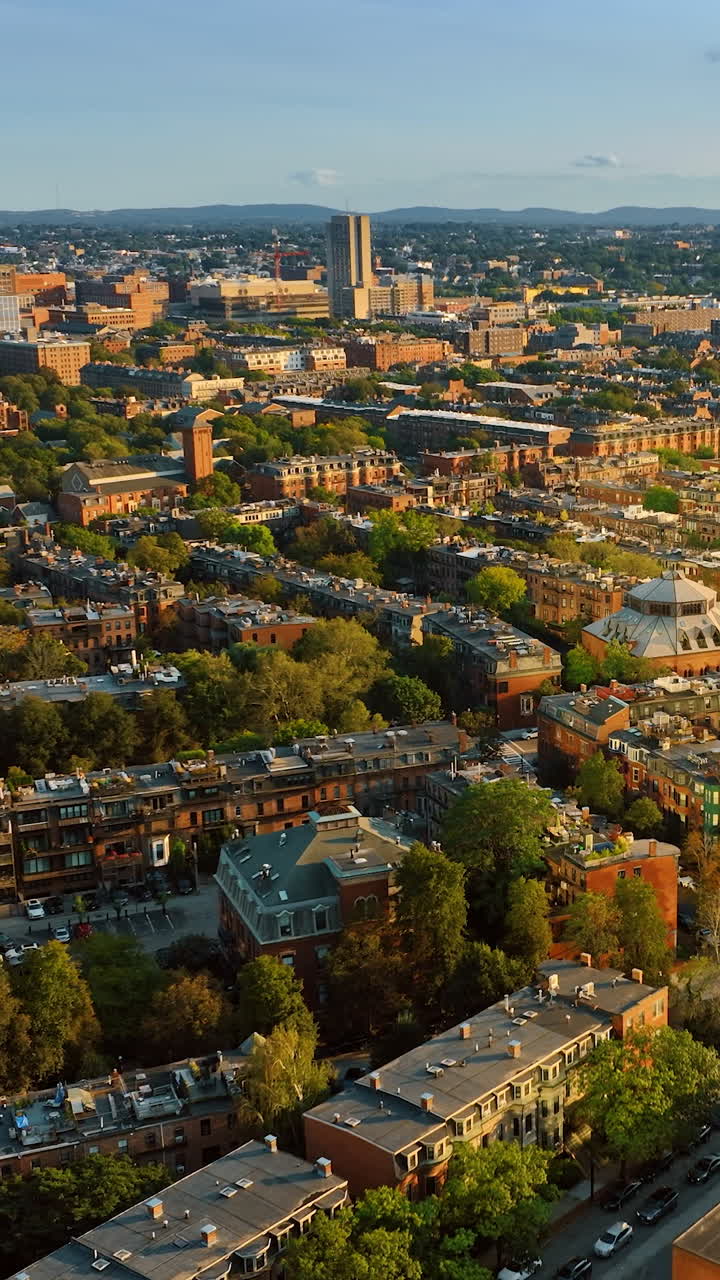 Sunny beautiful view of Boston from aerial perspective. Low-rise architecture in the scenery of a metropolis.. Vertical video