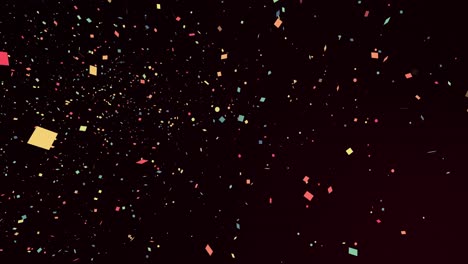 multicoloured pieces of confetti falling seamlessly on a black background