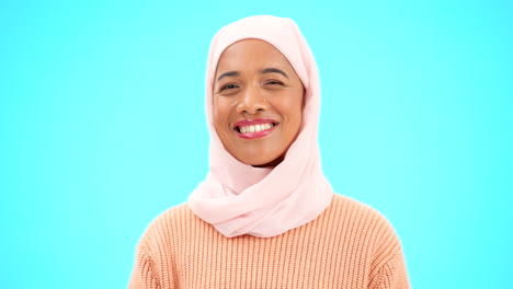 Muslim,-wink-and-face-of-a-woman-with-a-smile