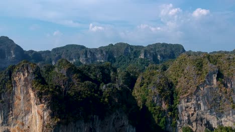 aerial of large mountain limestone karsts in railay beach, ao nang, krabi, thailand