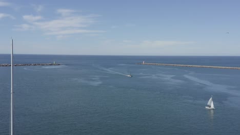 Flying Close Over Luxurious White Yachts and Catamarans Parked in Clear Blue Ocean Waters, Praia Cape Verde, Drone Aerial