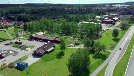 Circling-Aerial-View-Of-Green-Idyllic-Townscape-in-a-Nordic-Country