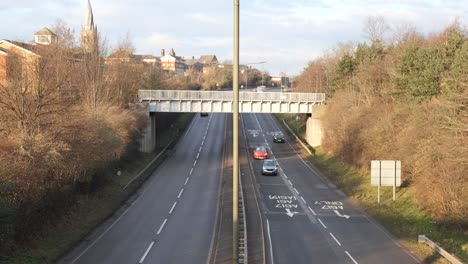 shot from above of traffic driving on a british dual carriageway