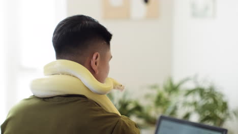 man working with snake at home