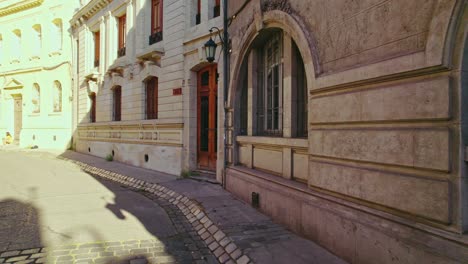 dolly in establishing the cobblestone streets of the concha y toro neighborhood in the lonely santiago chile sunset