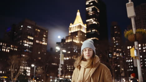 woman in new york city at night
