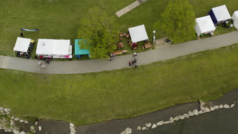 aerial - booths during dogwood festival, siloam springs, arkansas, top down view