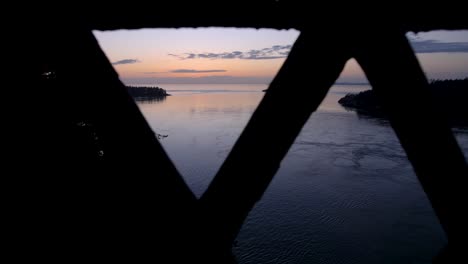 view coming through bridge looking onto deception pass at sunset