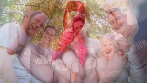 Animation-of-diverse-group-of-volunteers-over-cancer-ribbon