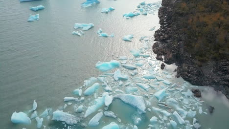 icebergs float in a glacial lake in the scenic mountain wilderness of patagonia, chile