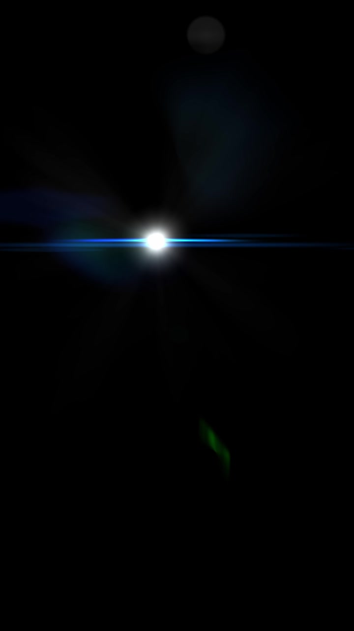 A subtle and organic Cooke anamorphic lens flare moving from left to right. Isolated on black background, perfect for adding a touch of cinematic realism, vertical format