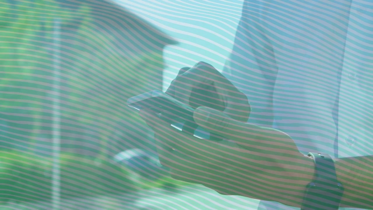 Man using phone by building, tapping screen, swiping and checking email, wavy overlay for tech demo