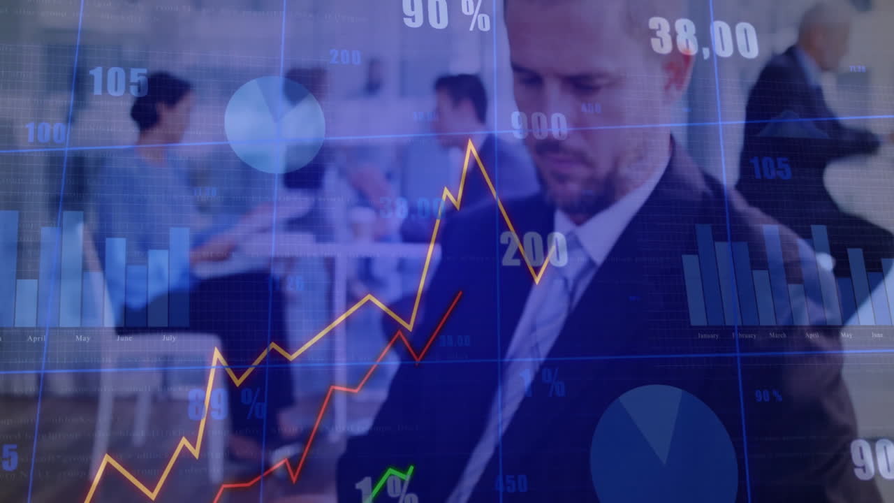 Working with financial graphs, businessman analyzing data overlay in office