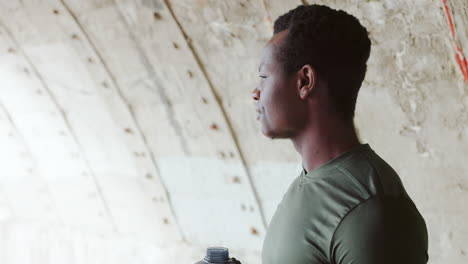 fitness, break and a black man drinking