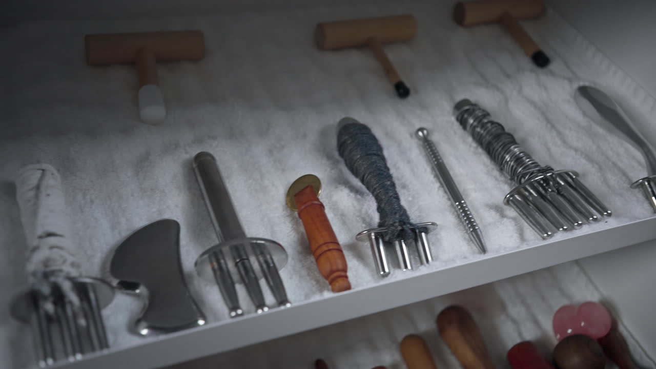 Gimbal shot of massage tools on a shelf