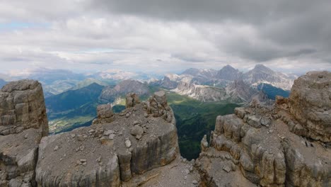 aerial trucking shot of rocky peaks of mountain